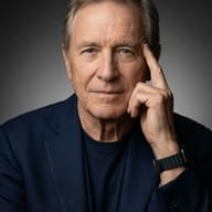 Mature Man in Blue Blazer AI Photo Editing Prompt. AI generated studio portrait of an older man in a navy blue blazer and smartwatch posing thoughtfully against a gray background.
