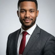 Professional Headshot Portrait Prompt. AI generated professional studio portrait of a man wearing a charcoal grey suit and a burgundy tie against a neutral background.